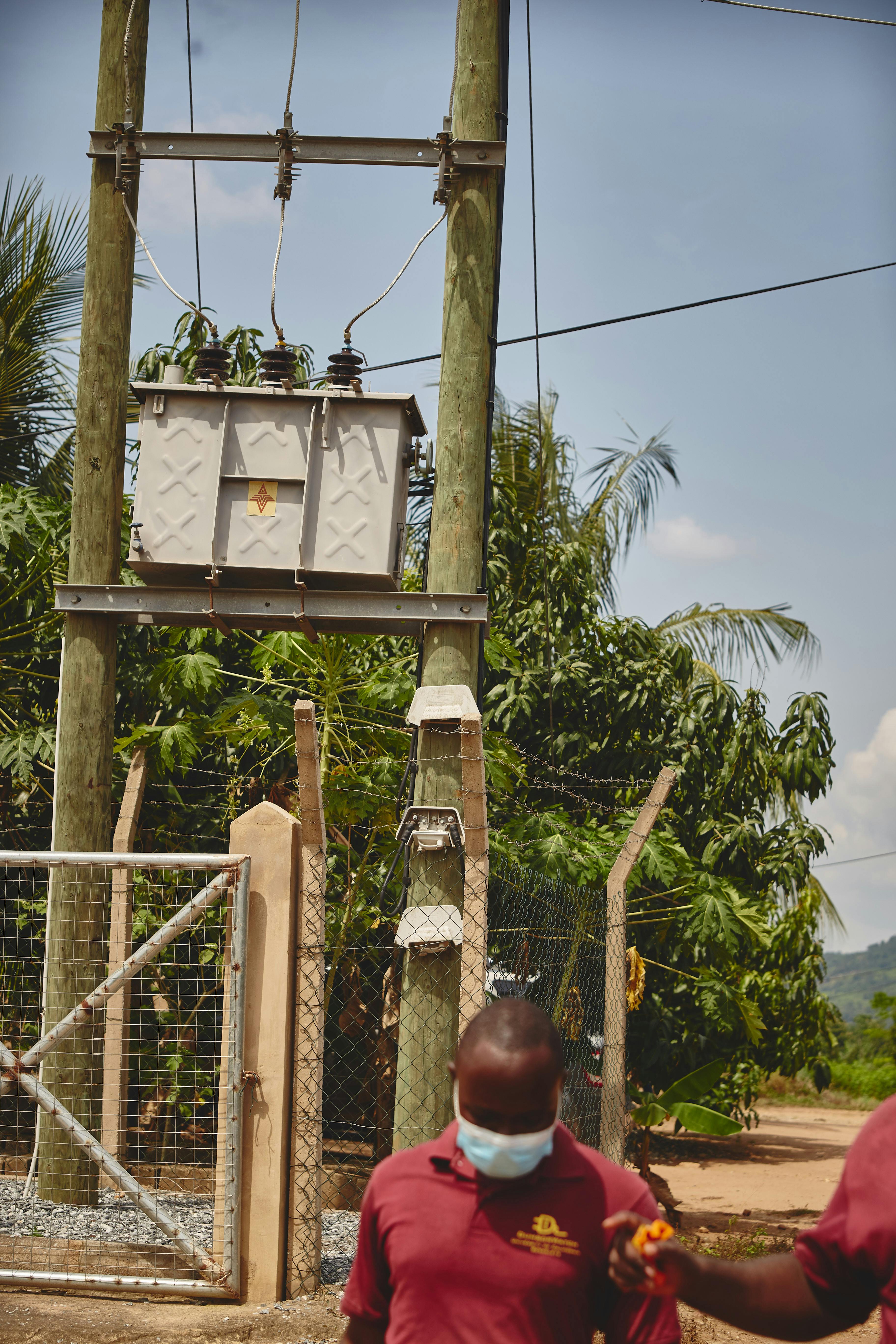 Field team members tracing low-voltage lines in more rural districts surrounding Accra.