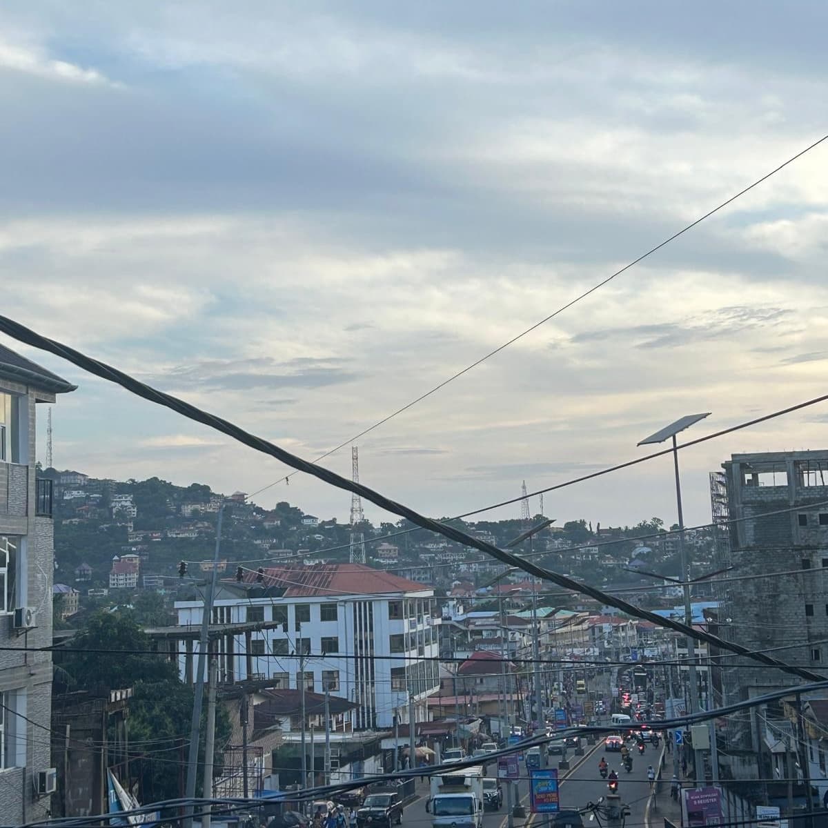 Utility and telecommunications lines crisscross in Freetown